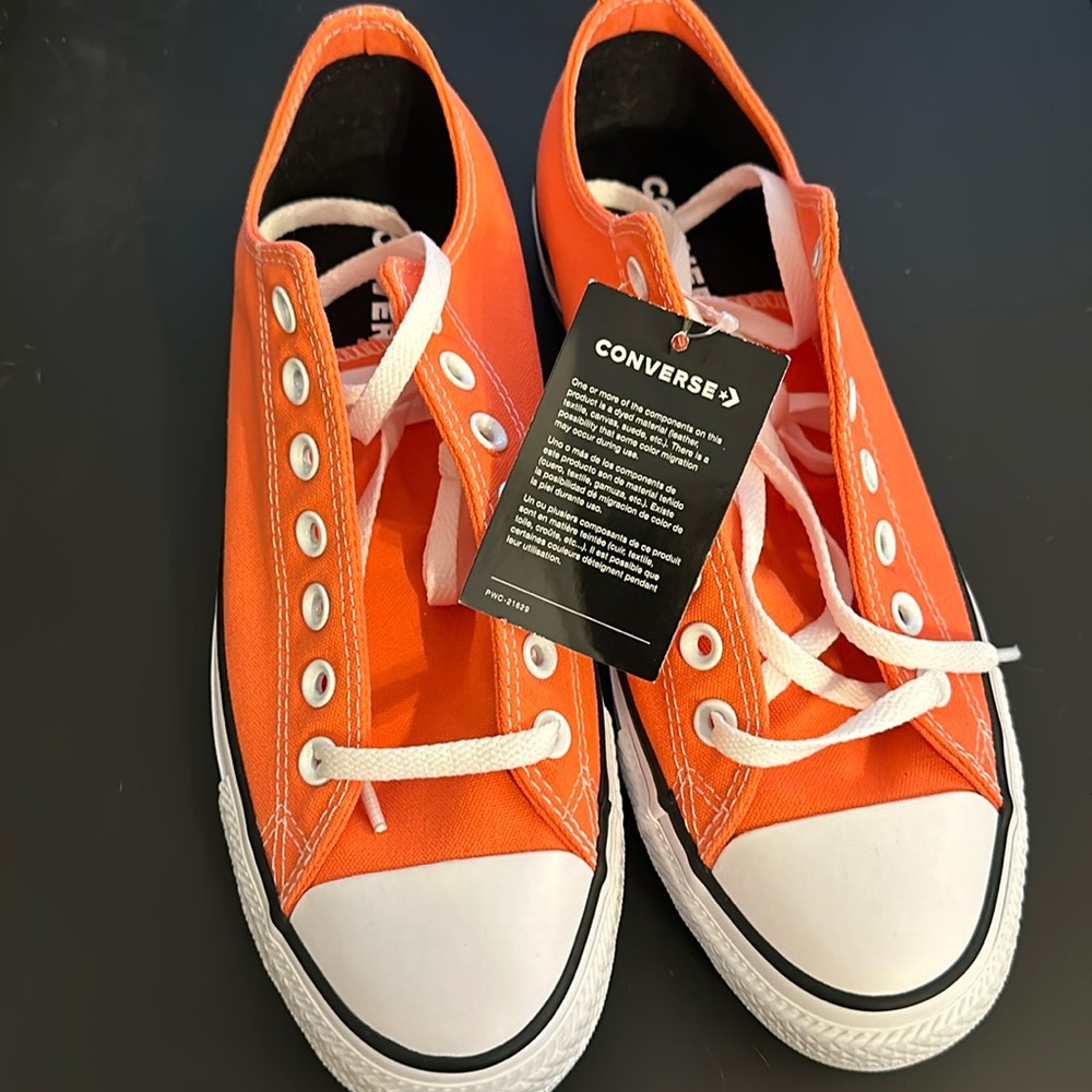 NWT-Converse All Stars, (men’s 9, women’s 11). Bright orange.